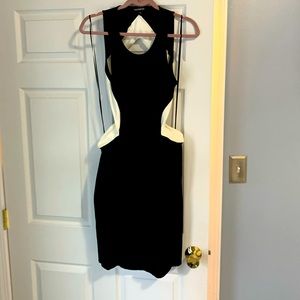 Super sexy never been worn back and little side cut out dress!